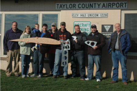 Pictured from left to right: Mark Phillips, Lori Parkinson, Steven Parkinson, Dwayne Parkinson, Mark Johnston, Christopher Owens, Caleb Ihrig, Brady Lane, and Bob Triplett. Photo by Joyce Triplett