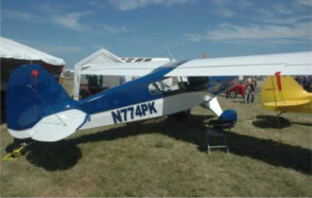 N774PK- This sharp looking patrol was on display at the Bearhawk booth all week. Courtesy of Don Aldridge and Hatcher Ferguson, from Va.